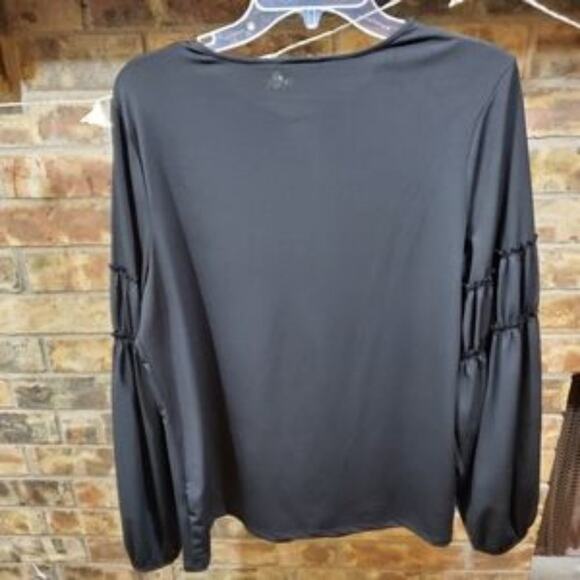 Guess black long sleeve top

Size large‎ - Picture 2 of 6